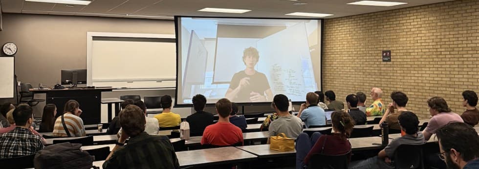 Laird Miller presenting remotely to an ASU Politics and Leadership Club classroom on starting a SaaS business
